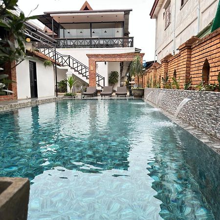 Win Hotel Vangviang Kültér fotó