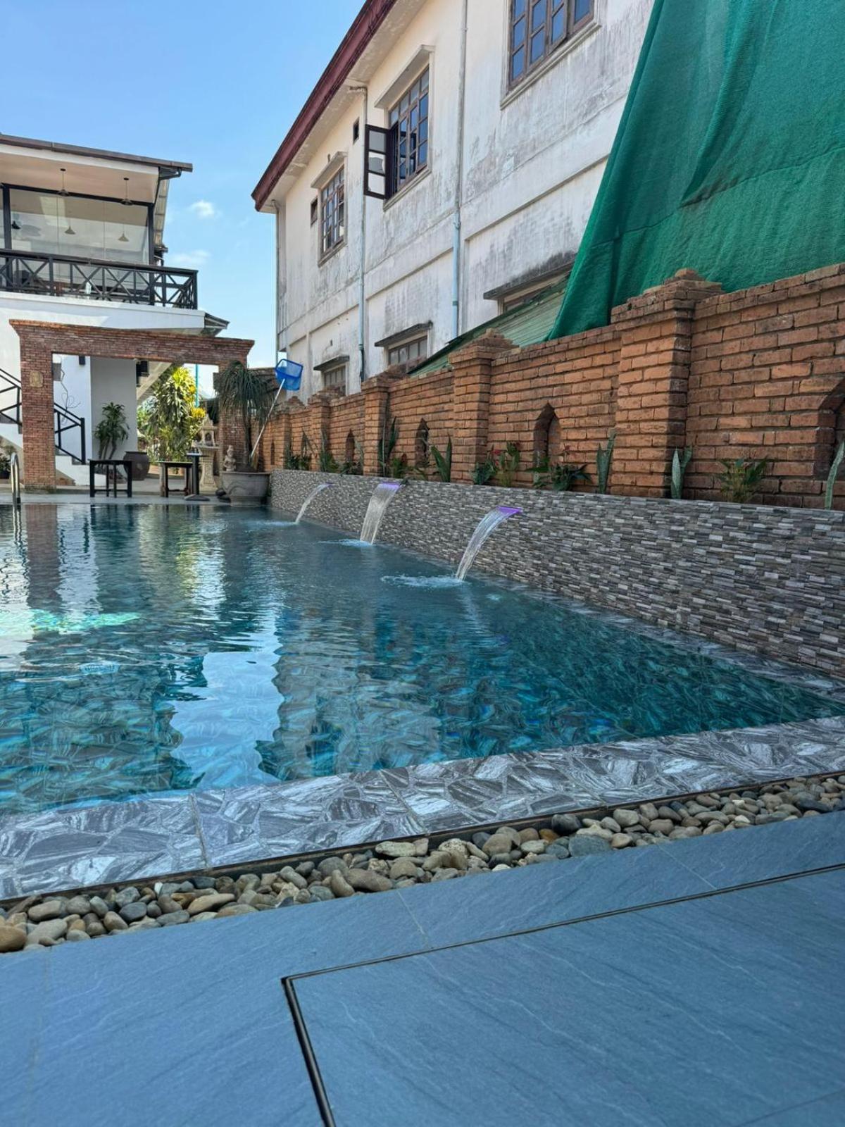 Win Hotel Vangviang Kültér fotó