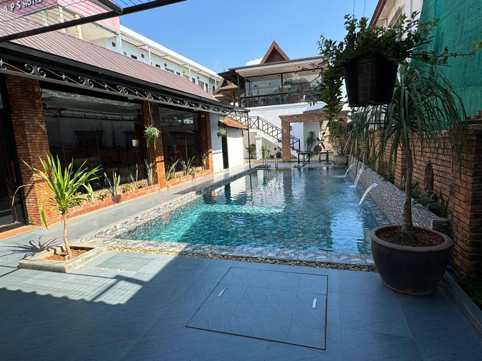 Win Hotel Vangviang Kültér fotó