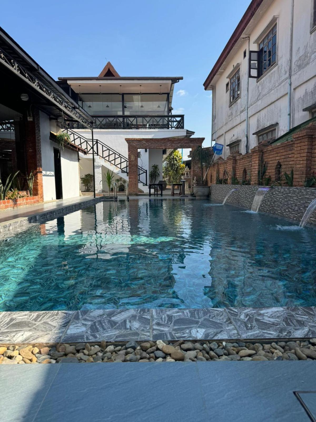 Win Hotel Vangviang Kültér fotó