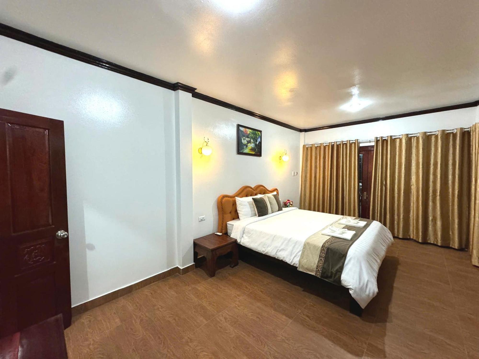 Win Hotel Vangviang Kültér fotó