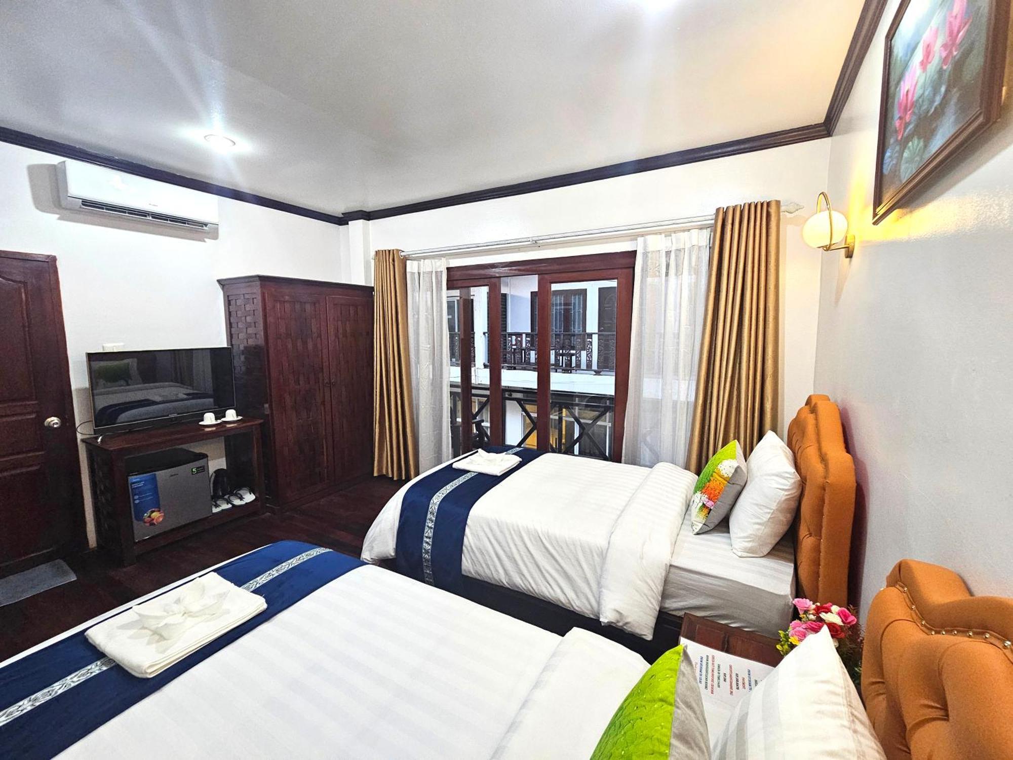 Win Hotel Vangviang Kültér fotó