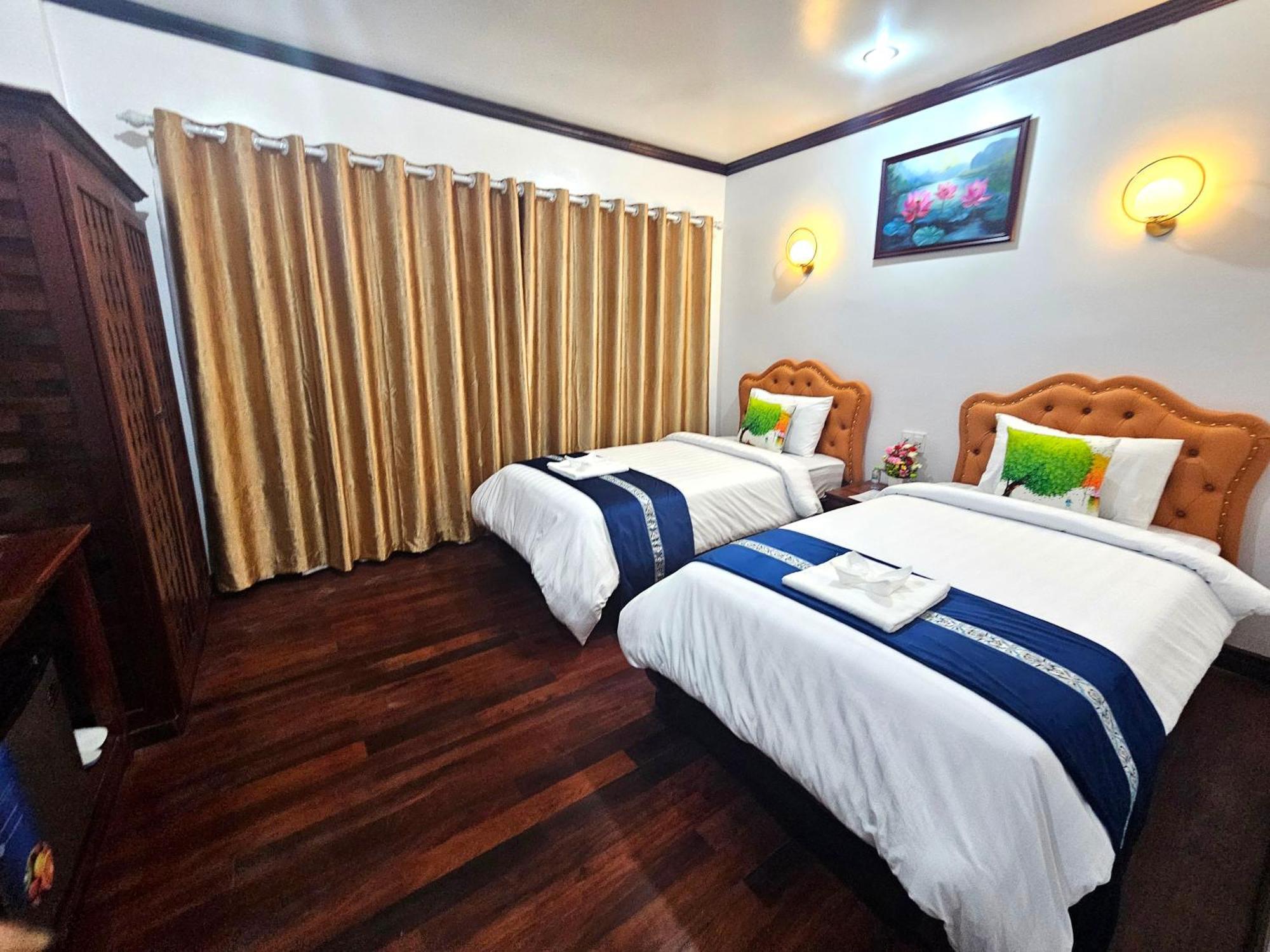 Win Hotel Vangviang Kültér fotó