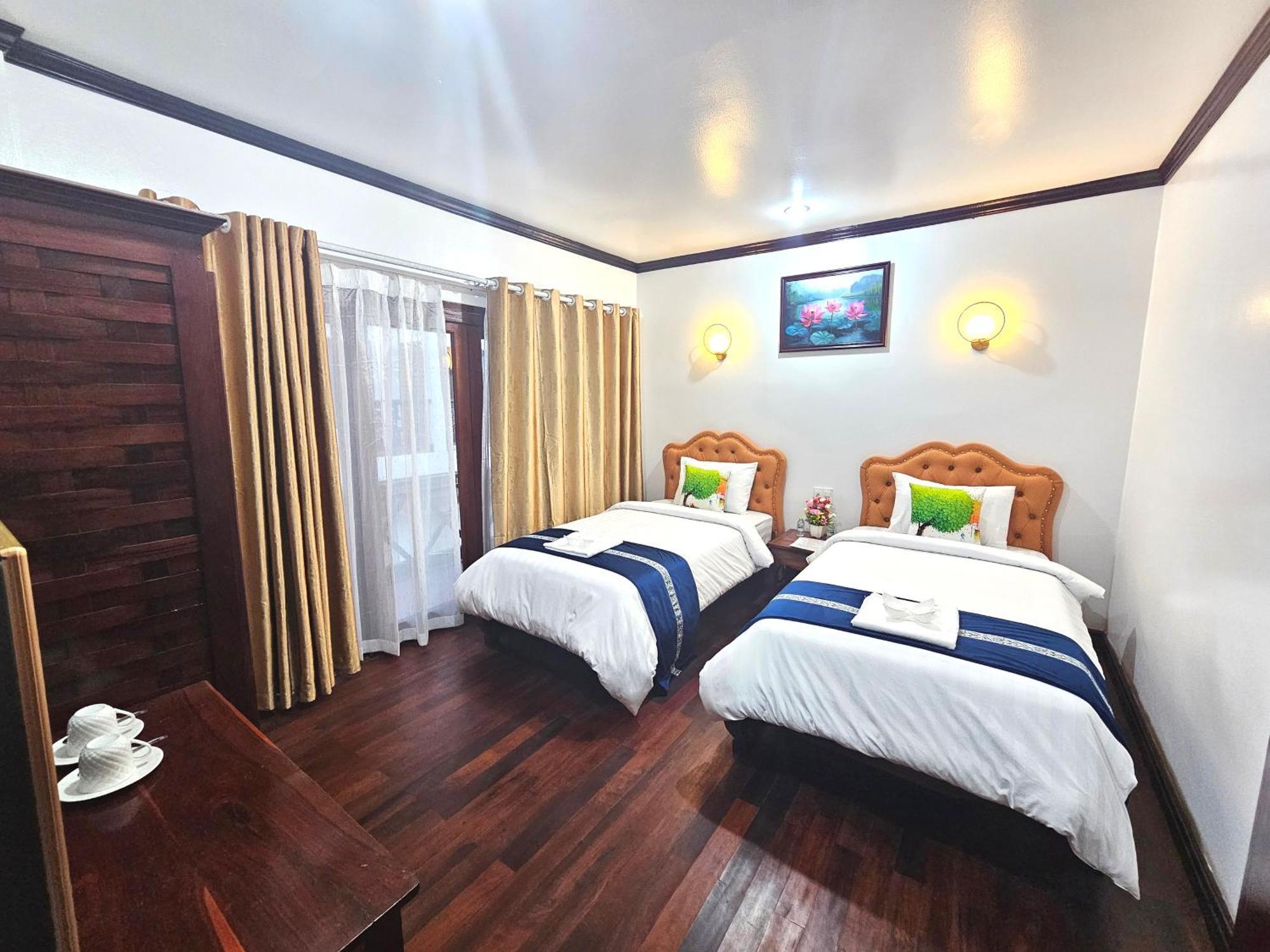Win Hotel Vangviang Kültér fotó