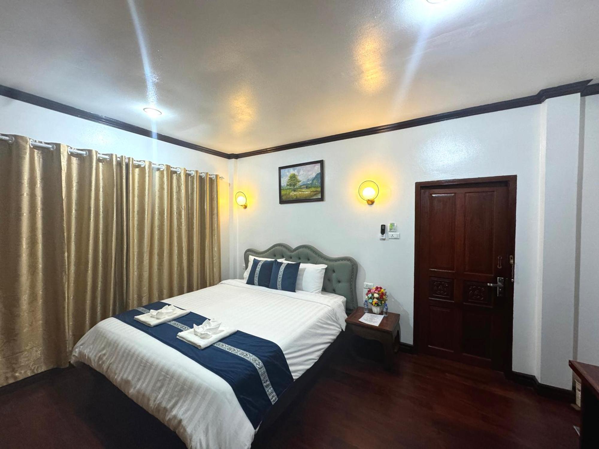 Win Hotel Vangviang Kültér fotó