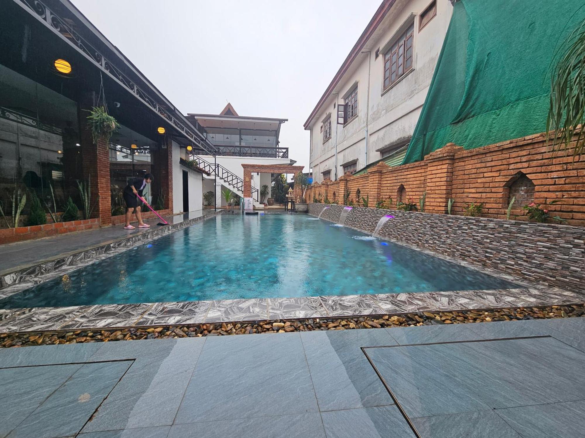 Win Hotel Vangviang Kültér fotó