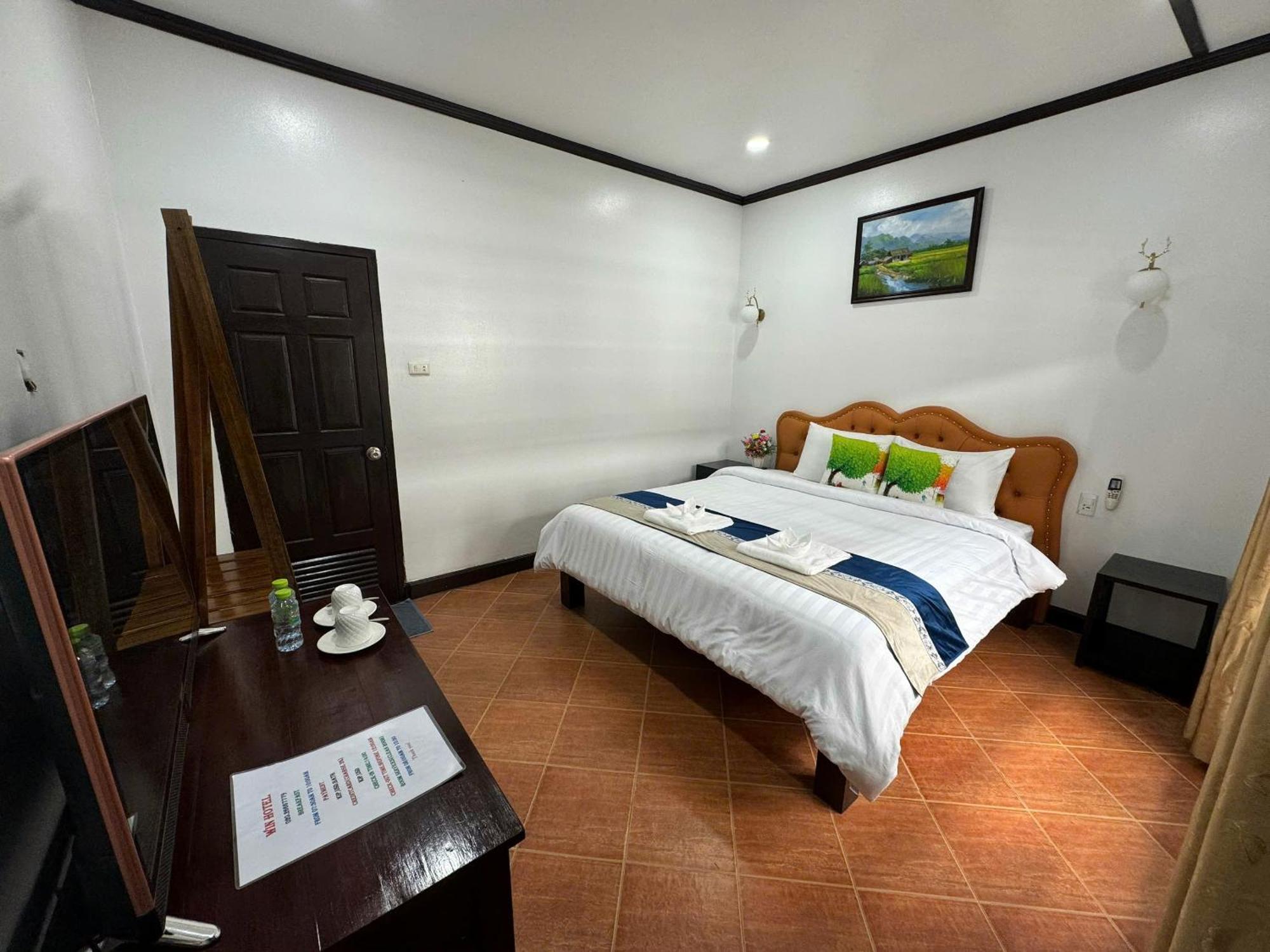 Win Hotel Vangviang Szoba fotó