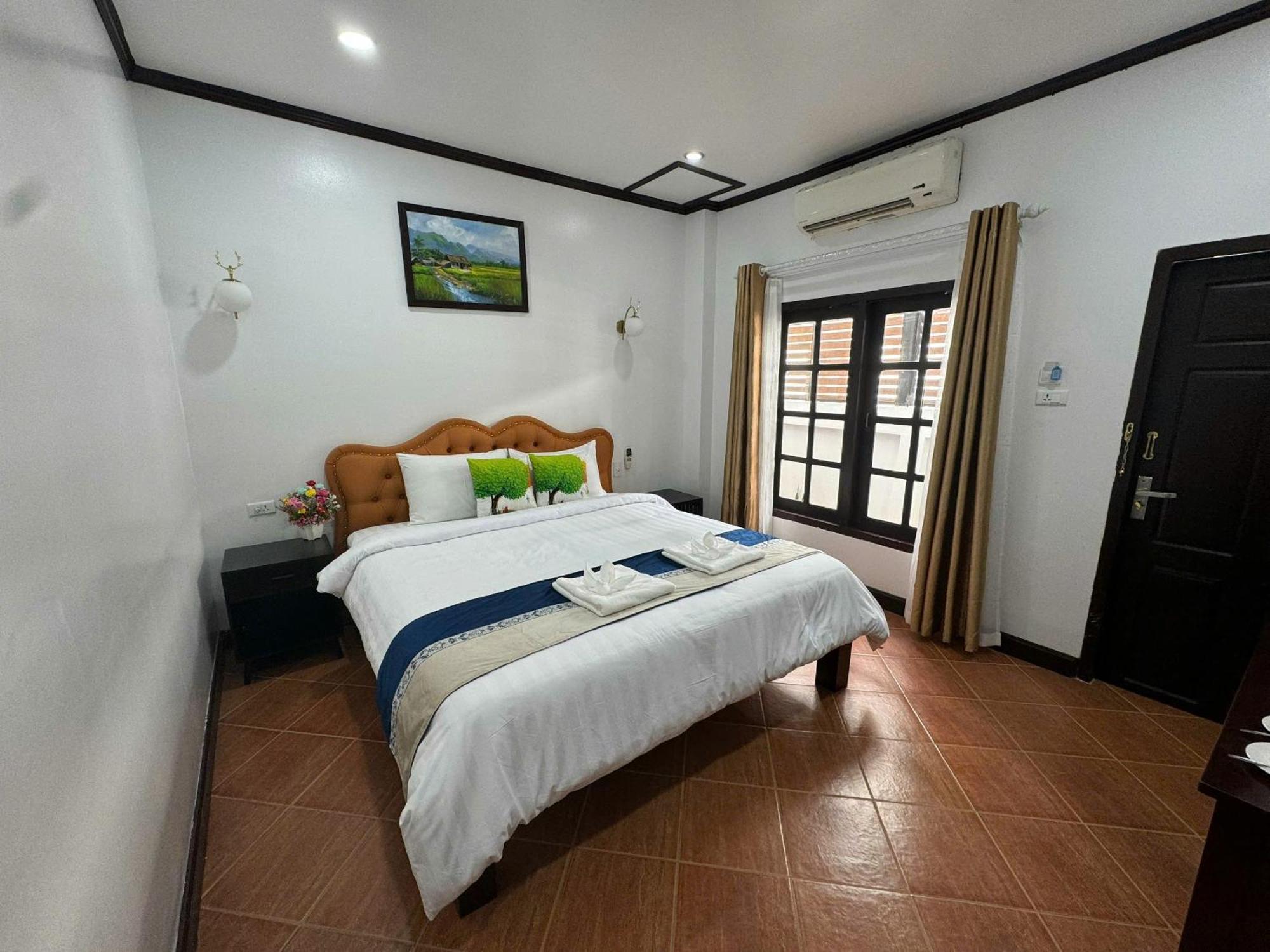 Win Hotel Vangviang Kültér fotó