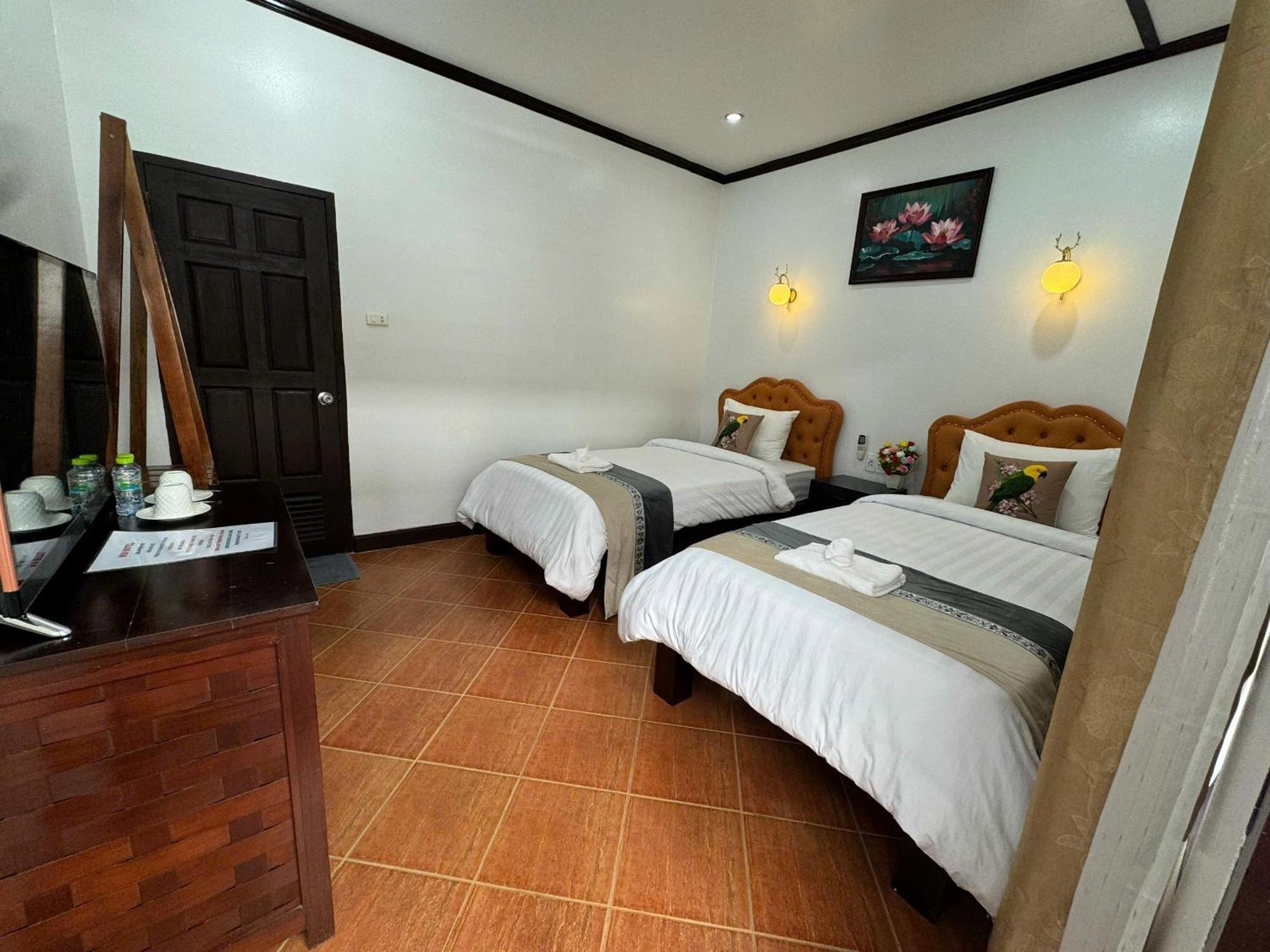Win Hotel Vangviang Szoba fotó