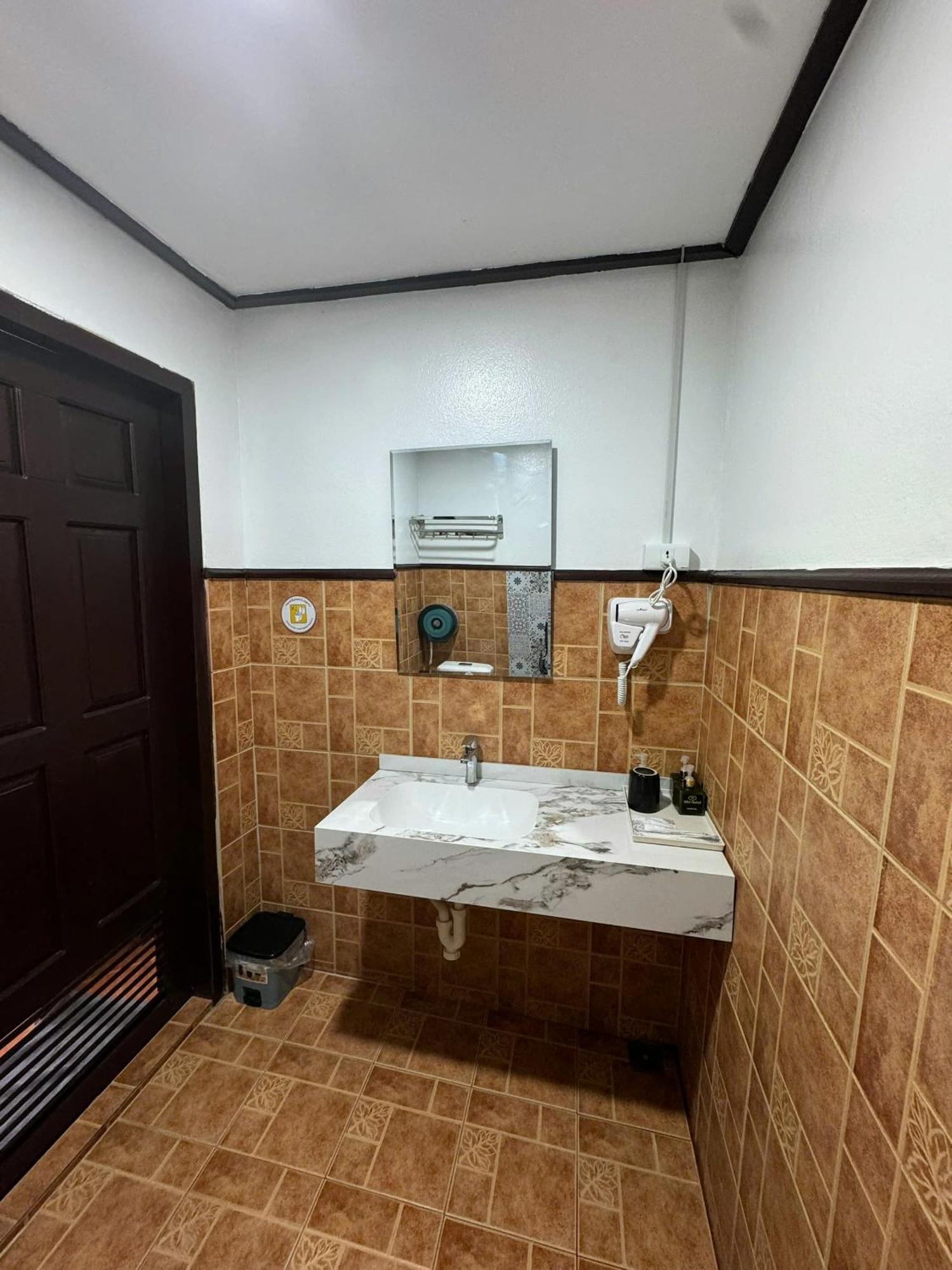 Win Hotel Vangviang Kültér fotó