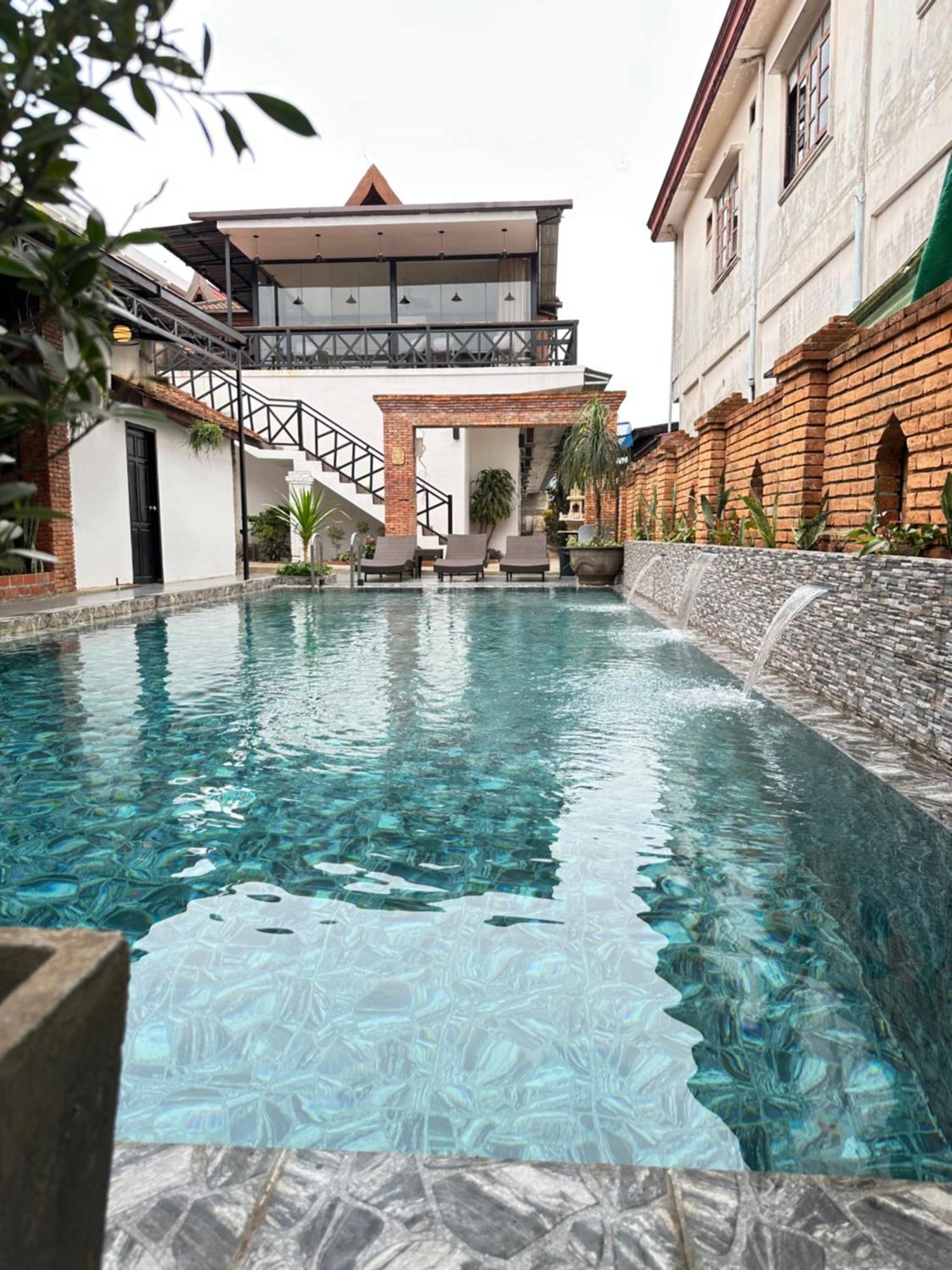 Win Hotel Vangviang Kültér fotó